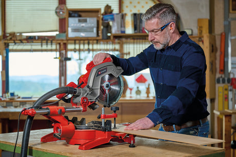 Fierastrau circular glisant Einhell TC - SM 254, 1.900 W, functie de tragere montata pe teava dubla, placa rotativa cu reglare rapida si pozitii de blocare, laser, lama de Fierastrau din carbura Einhell - scule electrice si unelte profesionale - BricoMart