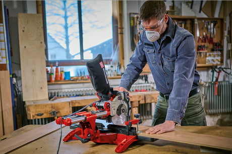 Fierastrau cu dubla tractiune, pentru taiere transversala si in unghi Einhell TC - SM 2131/2, max. 1.800 W, 4.900 rpm, functie de tractiune integrata, opritor piesa de lucru, dispozitiv de prindere, lama de Fierastrau cu varf de carbura, laser Einhell - scule electrice si unelte profesionale - BricoMart