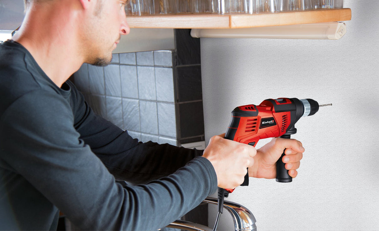 Masina de gaurit si insurubat (bormasina) cu impact Einhell TC - ID 550 E, 550 W, control electronic al vitezei, preselectare a vitezei, rotatie in ambele sensuri, opritor de adancime metalic, maner suplimentar Einhell - scule electrice si unelte profesionale - BricoMart