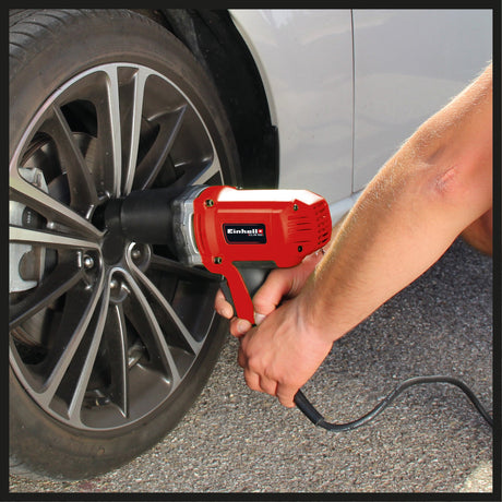 Masina de insurubat de impact auto Einhell CC - IW 950, 950W, 2300 1/min, 450Nm, maner moale, comutator basculant pentru inversarea directiei, 4 biti pentru chei tubulare si geanta de transport Einhell - scule electrice si unelte profesionale - BricoMart
